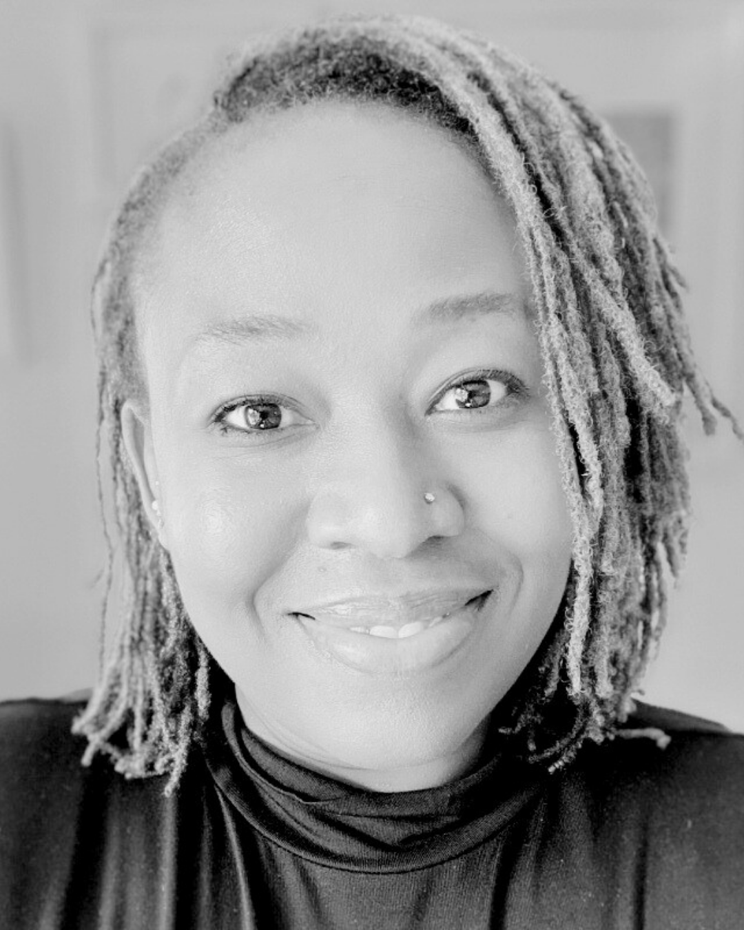 headshot image of Tinashe Wingfield